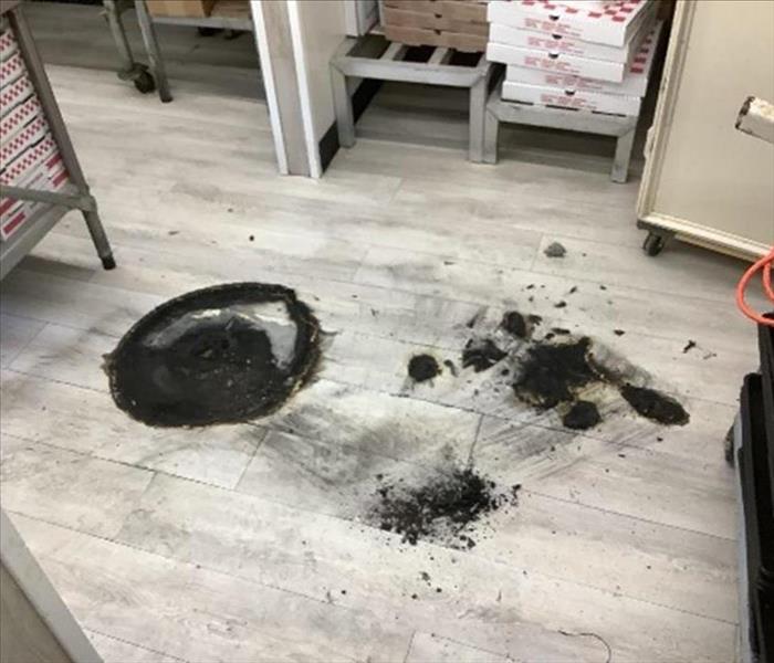 soot damage on floor